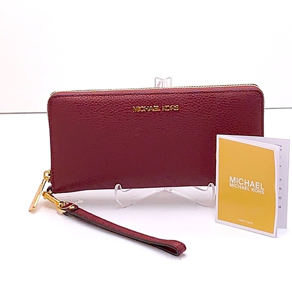 MICHAEL KORS
Leather Continental Wristlet Phone Case Wallet
Oxblood
NWT - Picture 2 of 16
